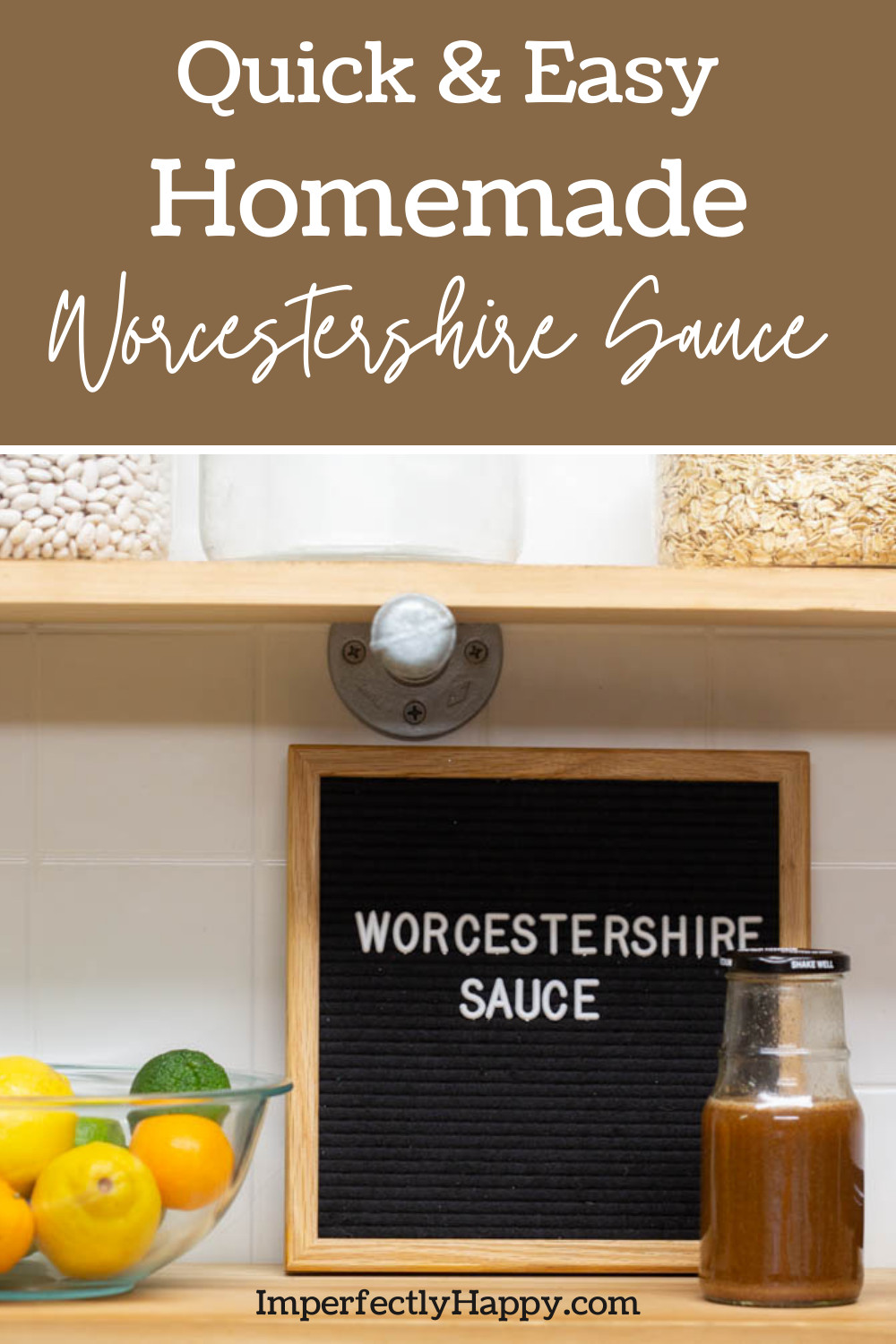 Homemade Worcestershire Sauce Pin - bottle of sauce on the counter, sign with title behind it.