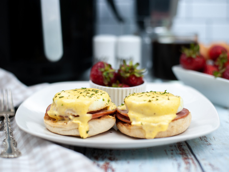 Air Fryer Eggs Benedict Recipe - prepared with a side of strawberries