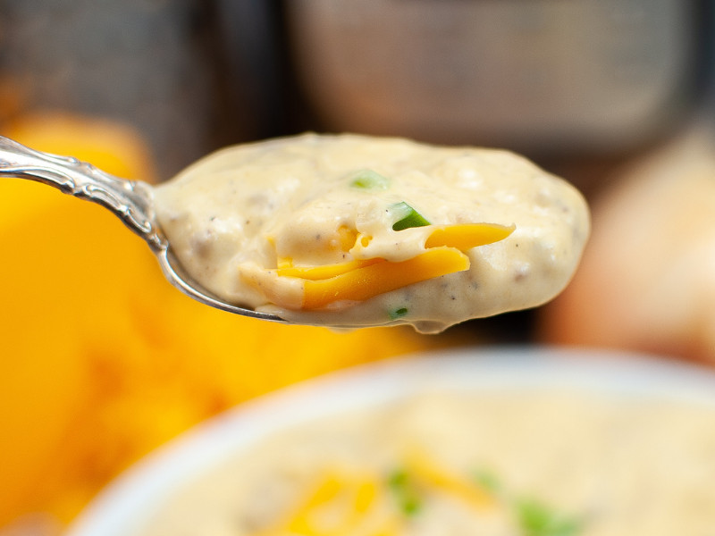 big bite of cheeseburger soup prepared in the instant pot
